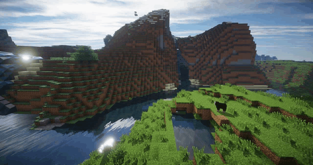 a minecraft landscape with a river and mountains