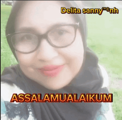 a woman wearing glasses and a hijab says " assalamualaikum " on the bottom of the image