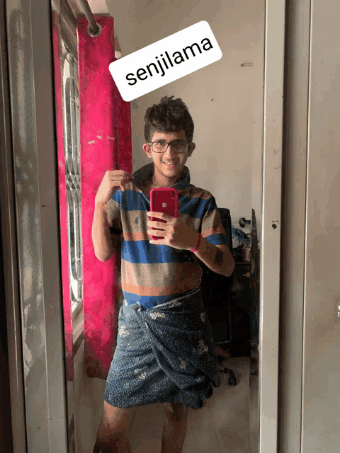 a boy taking a picture of himself with a sign that says senjilama on it