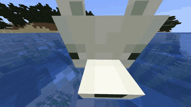 a polar bear is swimming in the water in a minecraft game