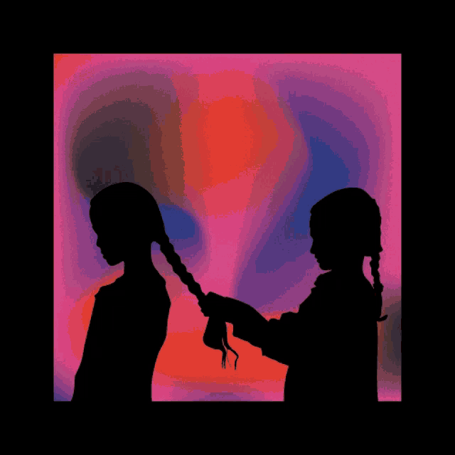 a silhouette of a girl braiding another girl 's hair against a colorful background