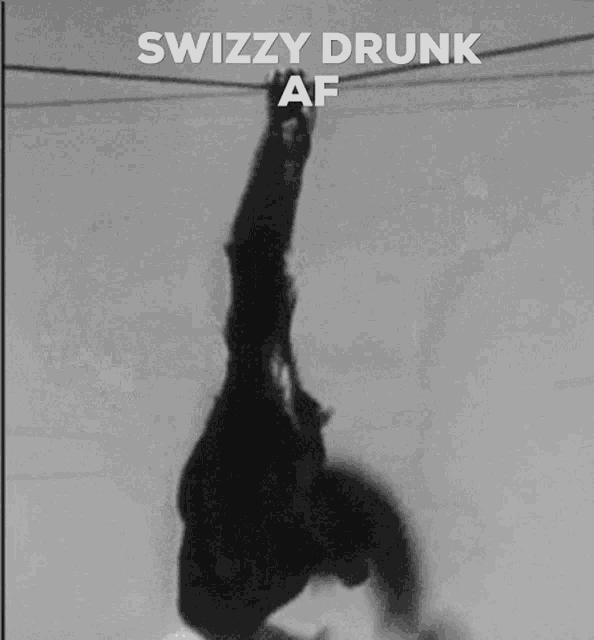 a black and white photo of a chimpanzee with the words swizzy drunk af on the bottom