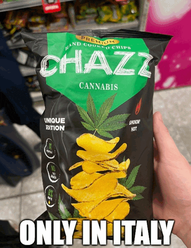 a person is holding a bag of chazzi cannabis potato chips