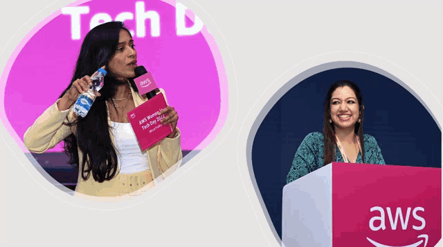 a woman holding a microphone next to an aws sign