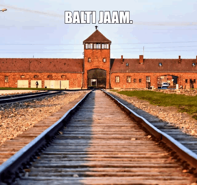 a picture of a train track with the words balti jaam