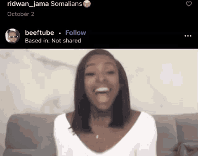 a picture of a woman laughing with the caption ridwan_jama somalians
