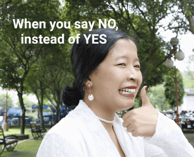 a woman giving a thumbs up with the words when you say no instead of yes below her