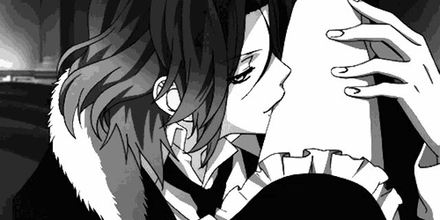 a black and white anime character with green eyes