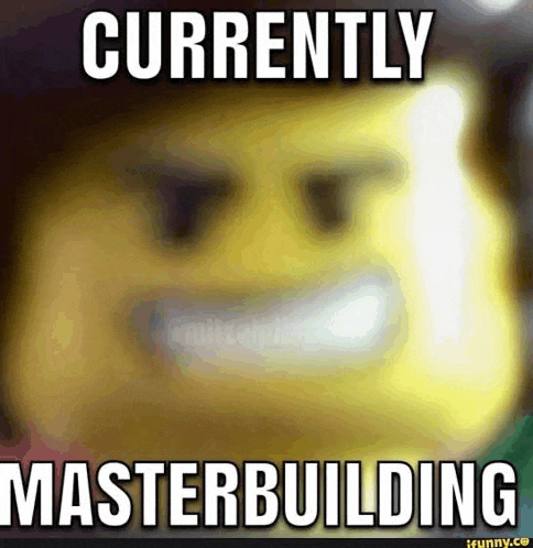 a blurry picture of a lego man with the words currently masterbuilding on it