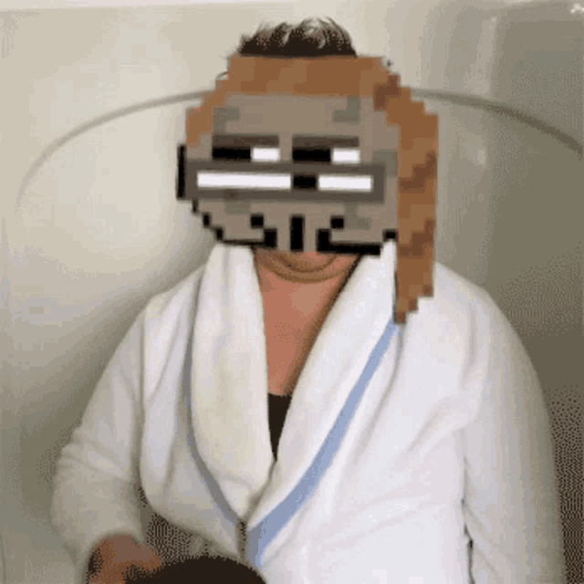 a pixelated image of a woman in a bathrobe with a mask on her face