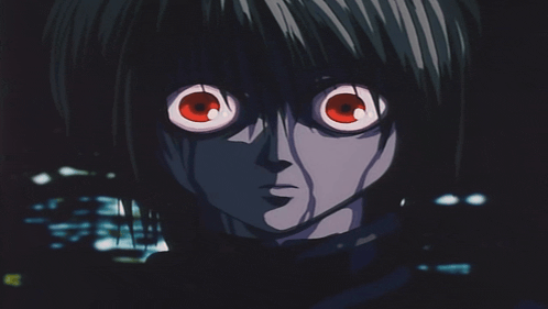 a close up of a cartoon character with red eyes