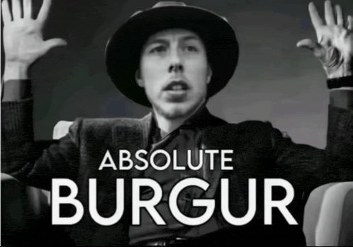 a black and white photo of a man with absolute burgundy written on the bottom