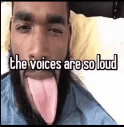 a man with a beard is sticking his tongue out and the words `` the voices are so loud '' are above him .