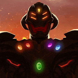 a close up of a cartoon character with the infinity stones around his chest .