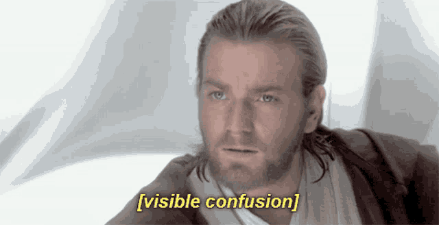 a man with a beard says " visible confusion " in yellow letters