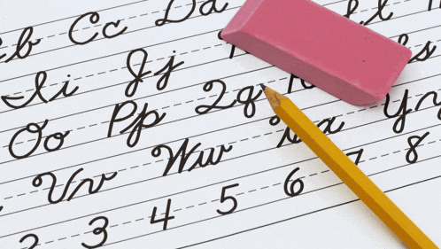 a pencil and eraser are on a piece of paper with the letters and numbers written in cursive