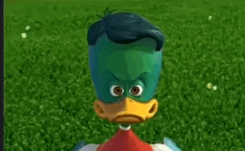 a cartoon duck wearing a mask is standing in the grass and looking at the camera .