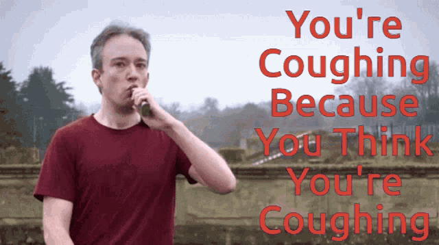 a man is coughing because he thinks he 's coughing in red letters