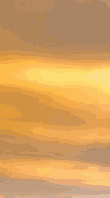 a sunset sky with a lot of clouds in it .