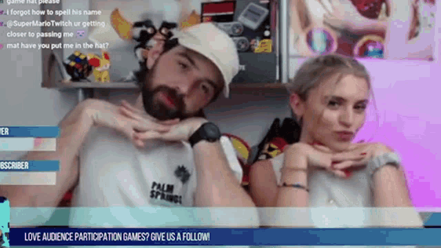 a man and a woman are sitting next to each other on a screen that says love audience participation games