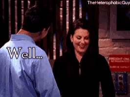 a man and woman are standing next to each other and the man is saying well