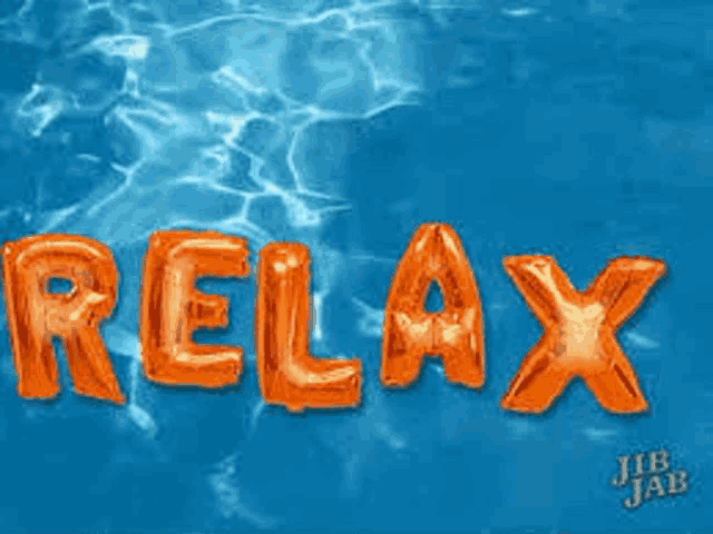 the word relax is written in orange balloons in the water