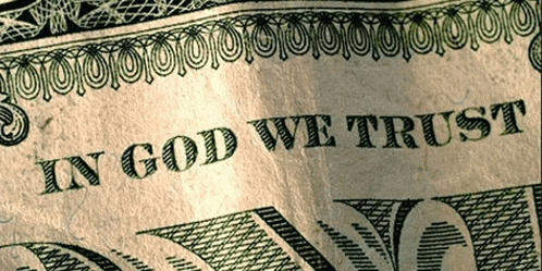 a dollar bill with the words in god we trust on it