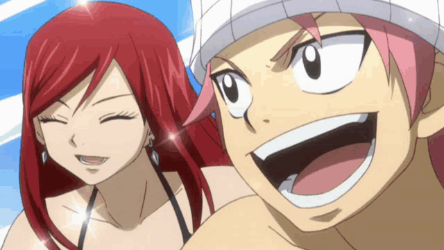 a boy and a girl with red hair are smiling