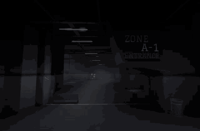 a dark hallway with a sign that says zone a- 1 entrance