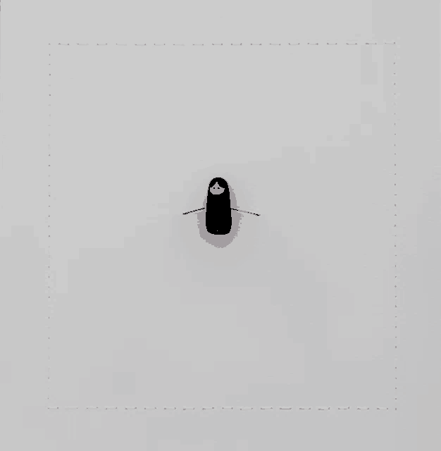 a red and black doll is on a white wall