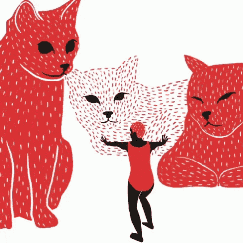 a woman in a red bathing suit is standing in front of a giant red cat