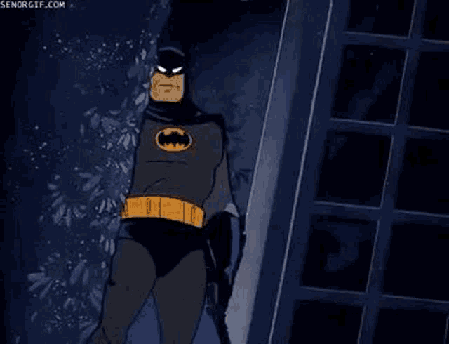 a cartoon of batman giving a thumbs up and saying batman approves .