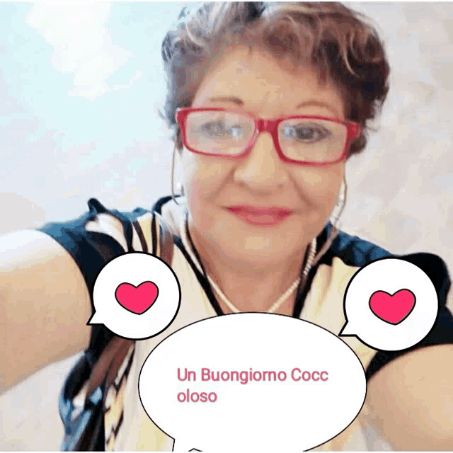 a woman taking a selfie with a speech bubble saying un buongiorno cocc oloso