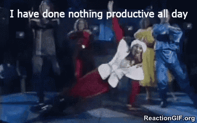 a man in a santa suit is doing a plank on a stage .