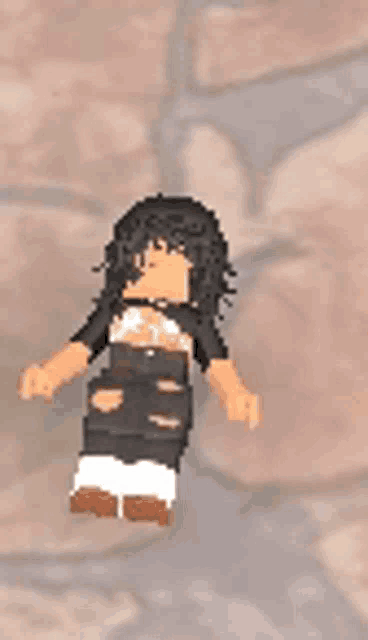 a pixel art of a girl with black hair standing in front of a brick wall .