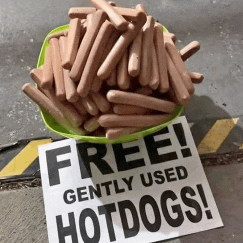 a sign that says free gently used hotdogs on it