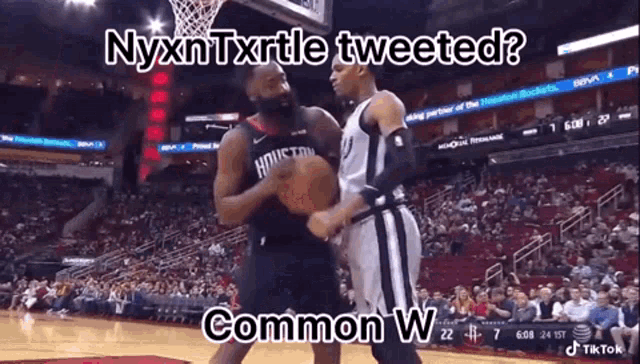 a basketball game is being played in front of a crowd with a caption that says " nyxntxrtle tweeted "