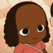 a close up of a cartoon character with big eyes and a pink shirt on .