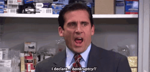 a man in a suit and tie says i declare bankruptcy !