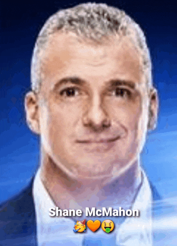 a close up of a man 's face with the name shane mcmahon at the bottom