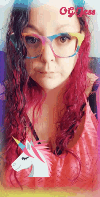 a woman with pink hair wearing glasses and the name jess on the bottom right