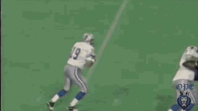 a football player wearing a jersey with the number 37 on it