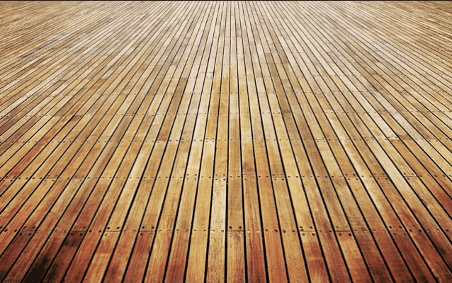 a wooden floor with a diagonal row of wooden planks