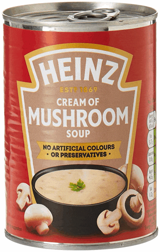 a can of heinz cream mushroom soup with mushrooms on the side