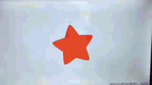 a cartoon character is flying through the air with a star in its mouth