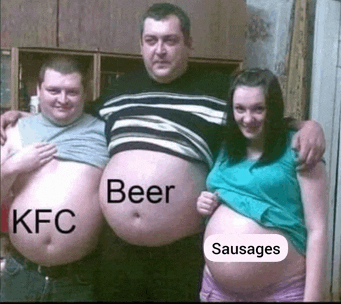 two men and a pregnant woman are posing for a picture with their stomachs filled with beer kfc and sausages .