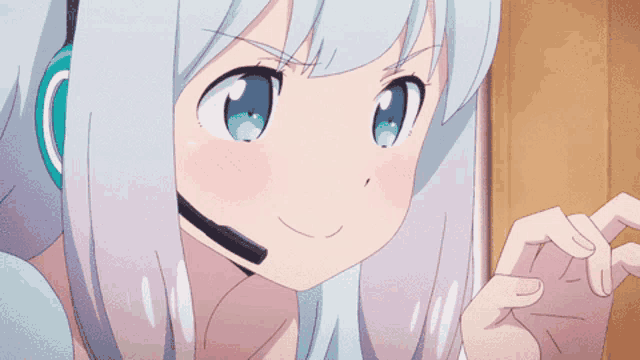 a girl with white hair and blue eyes has a headset on