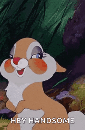 a cartoon rabbit is smiling and says hey handsome .