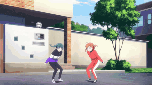 two anime girls are standing in front of a building with a sign that says " a " on it