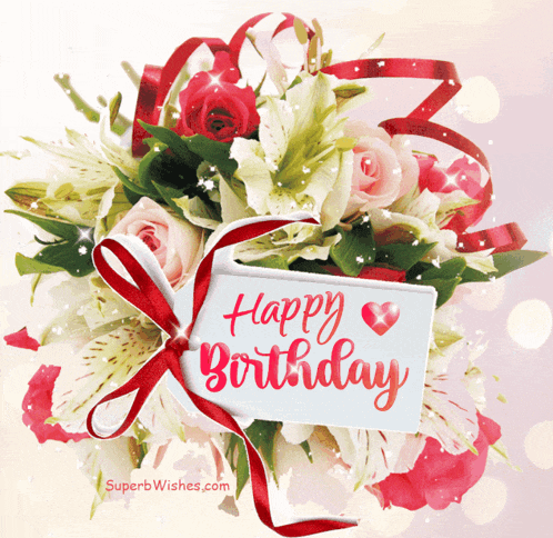a bouquet of flowers and a card that says happy birthday